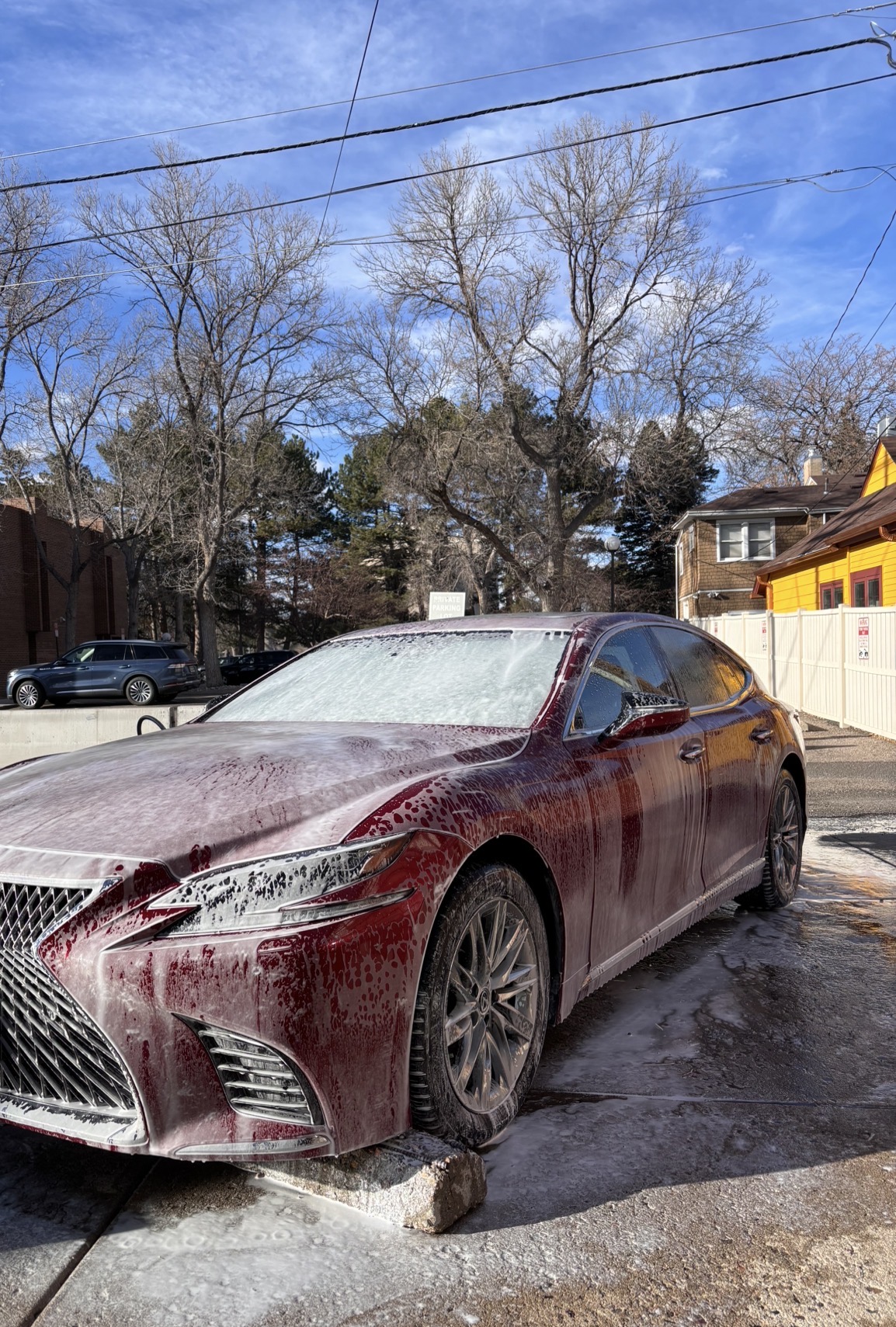 Lexus covered in foam during exterior wash